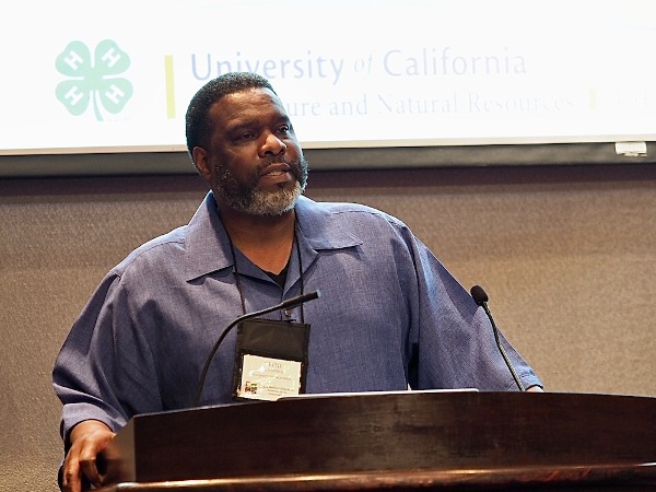 Keith Nathaniel from the University of California Extension in Los Angeles County presents during the National Extension Conference on Volunteerism in Tulsa. (Photo by Todd Johnson, OSU Agricultural Communications Services) volunteer conference speaker
