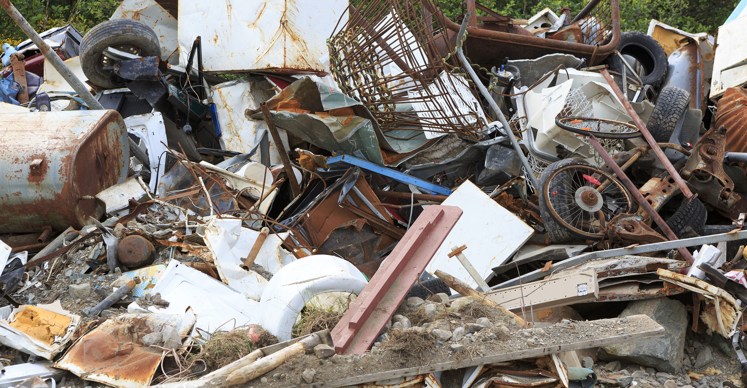 Illegal dumpsite full of trash.