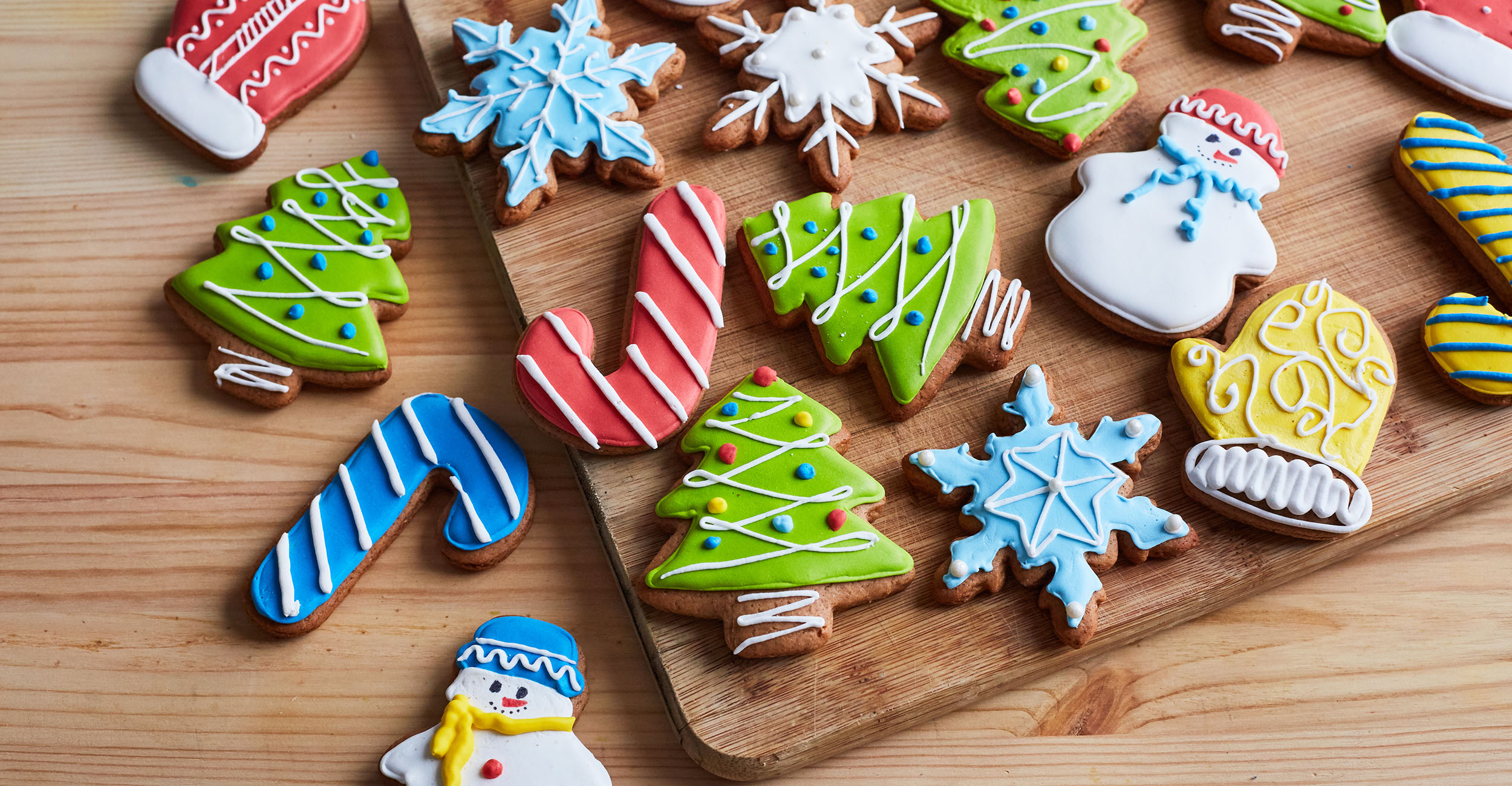 Counter covered with Christmas cookies.