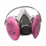A grey, black, and pink colored respirator. 