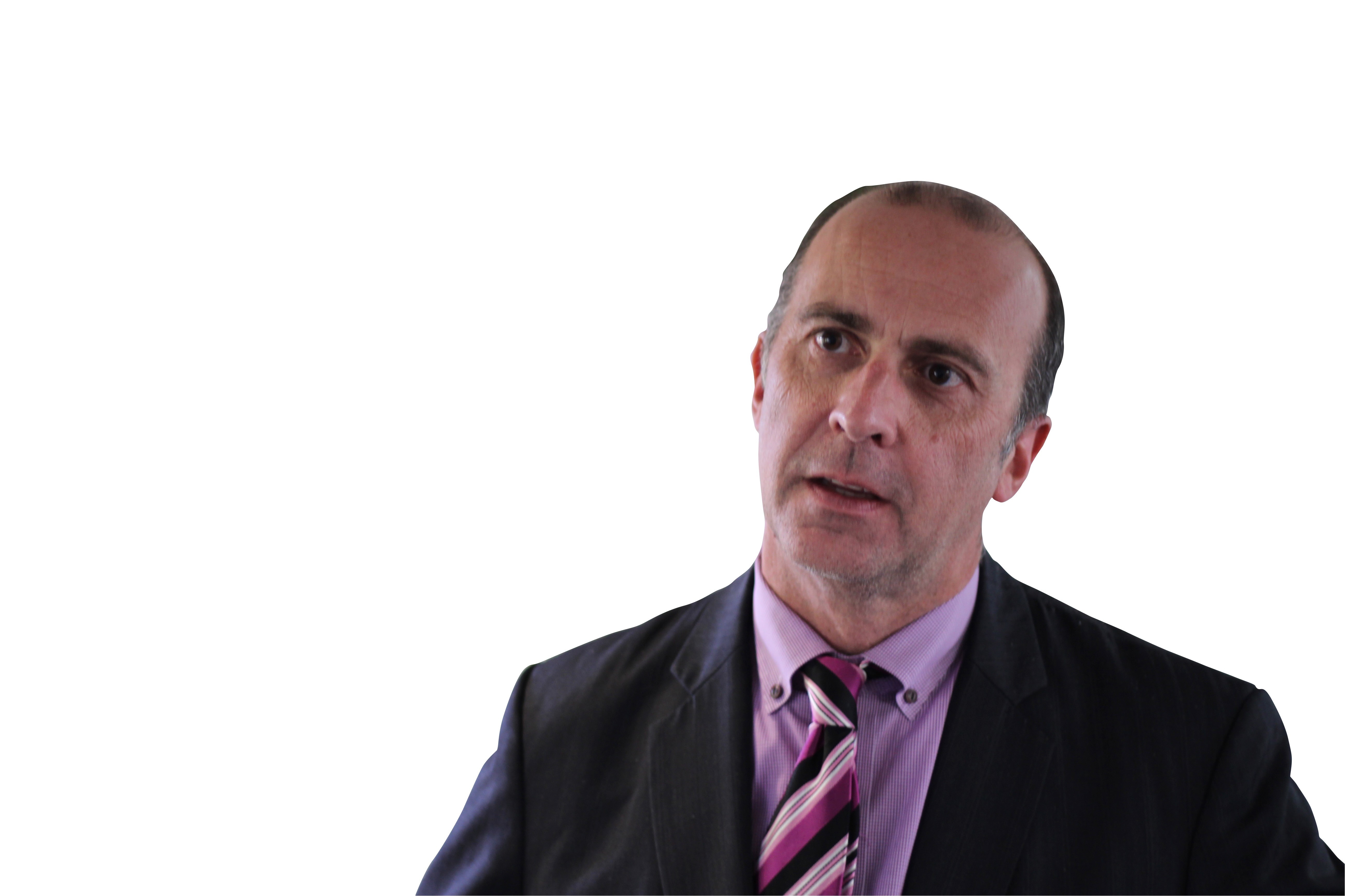 A professional headshot of Martin Cowling.