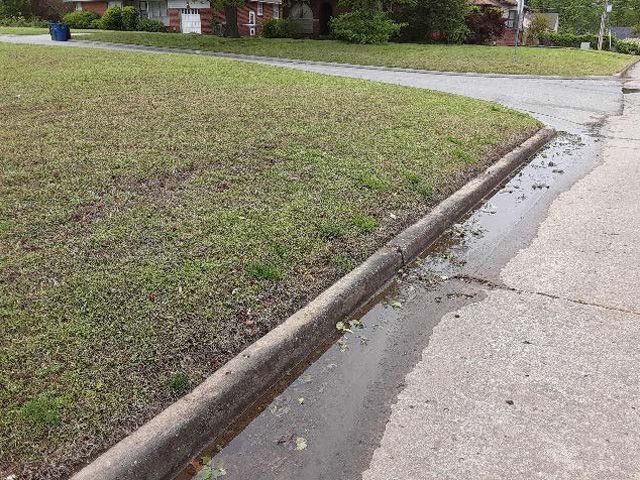 Water in a road with no other source (irrigation, etc.) detected and a wet soil surface near the curb. Water in a road with no other source (irrigation, etc.) detected and a wet soil surface near the curb.
