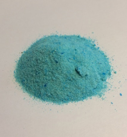 A pile of copper sulfate cystals.