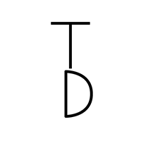 The letters T and D stacked on top of each other.