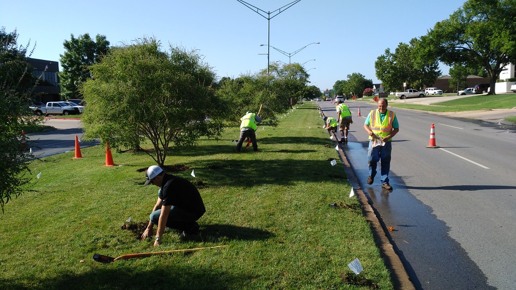 Construction workers working on Oklahoma City median retrofit project on North Classen Boulevard. 