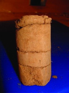 A 4-inch compacted soil core.