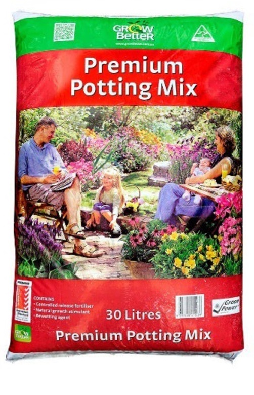 A bag labeled "Grow Better; Premium Potting Mix," designed for enhancing plant growth.