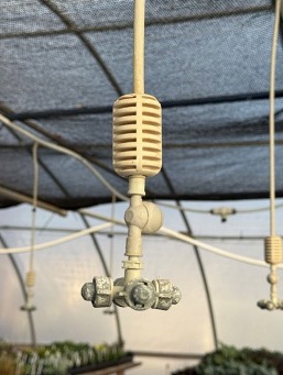 A greenhouse mister used for starting seeds.