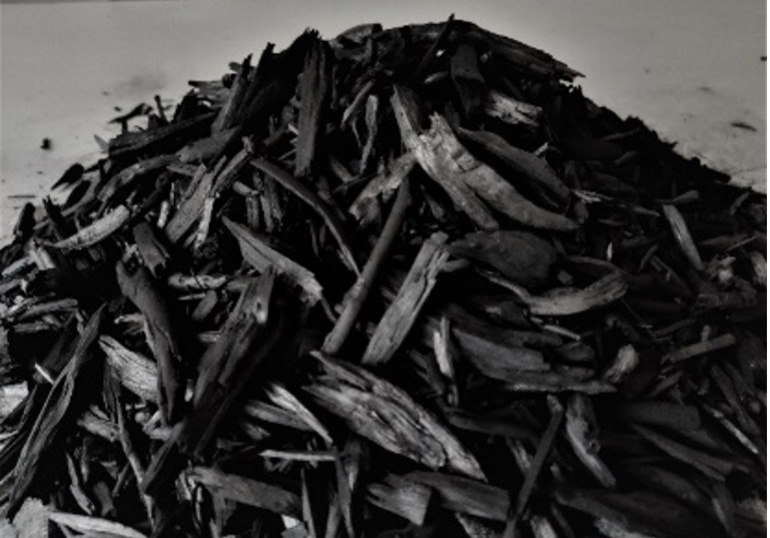 Eastern red cedar mulch biochar prepared from double barrel system.