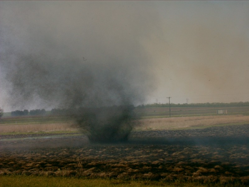 A burning grass plot.