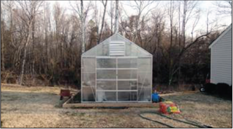 Hobby-scale greenhouse.