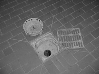 A floor drain.