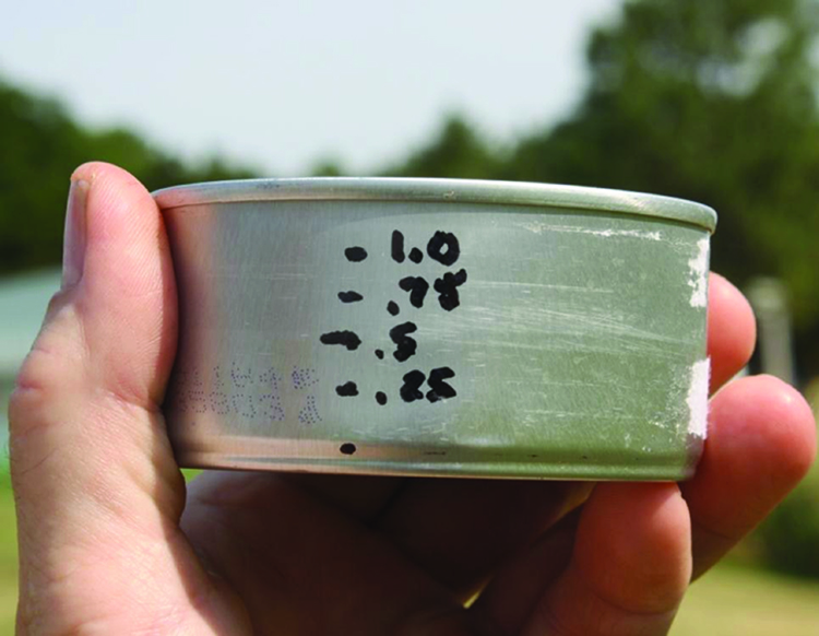 Marks on the side of a catch cup.