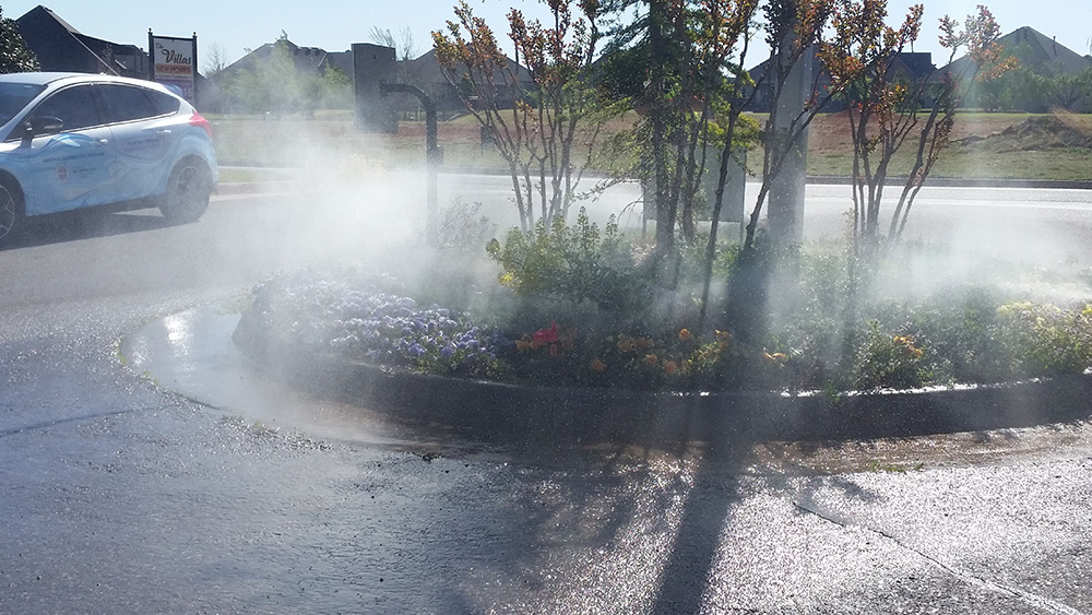 Sprinkler heads with excessive or high pressure causing misting of irrigation water.