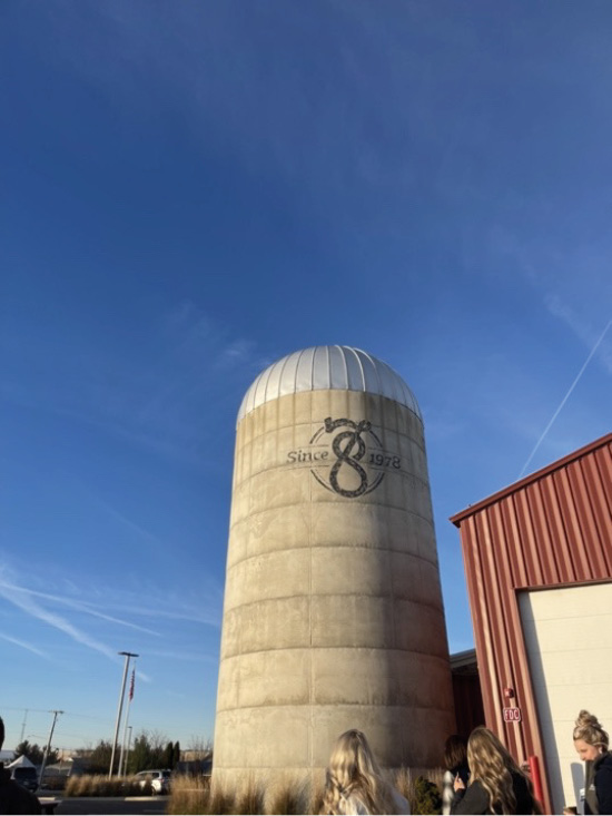 A large white dome beneath a big blue sky.