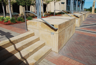 Reinforced retaining wall as part of the security design at the front of Federal Reserve Bank of Minneapolis.