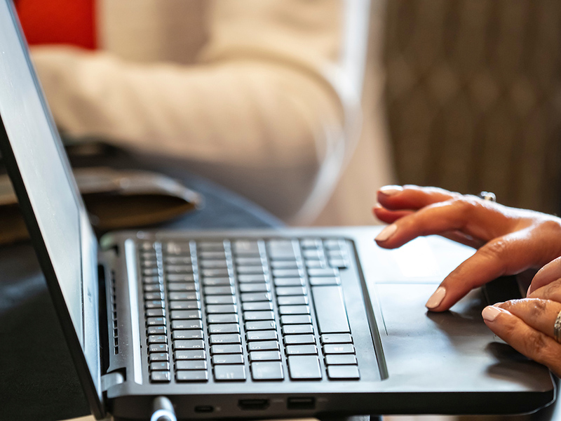 Woman using laptop computer. Woman using laptop computer.