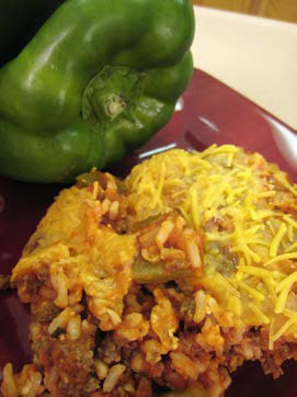 Photo of deconstructed stuffed peppers casserole on a plate.