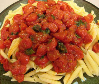 Fresh tomato sauce served over pasta.