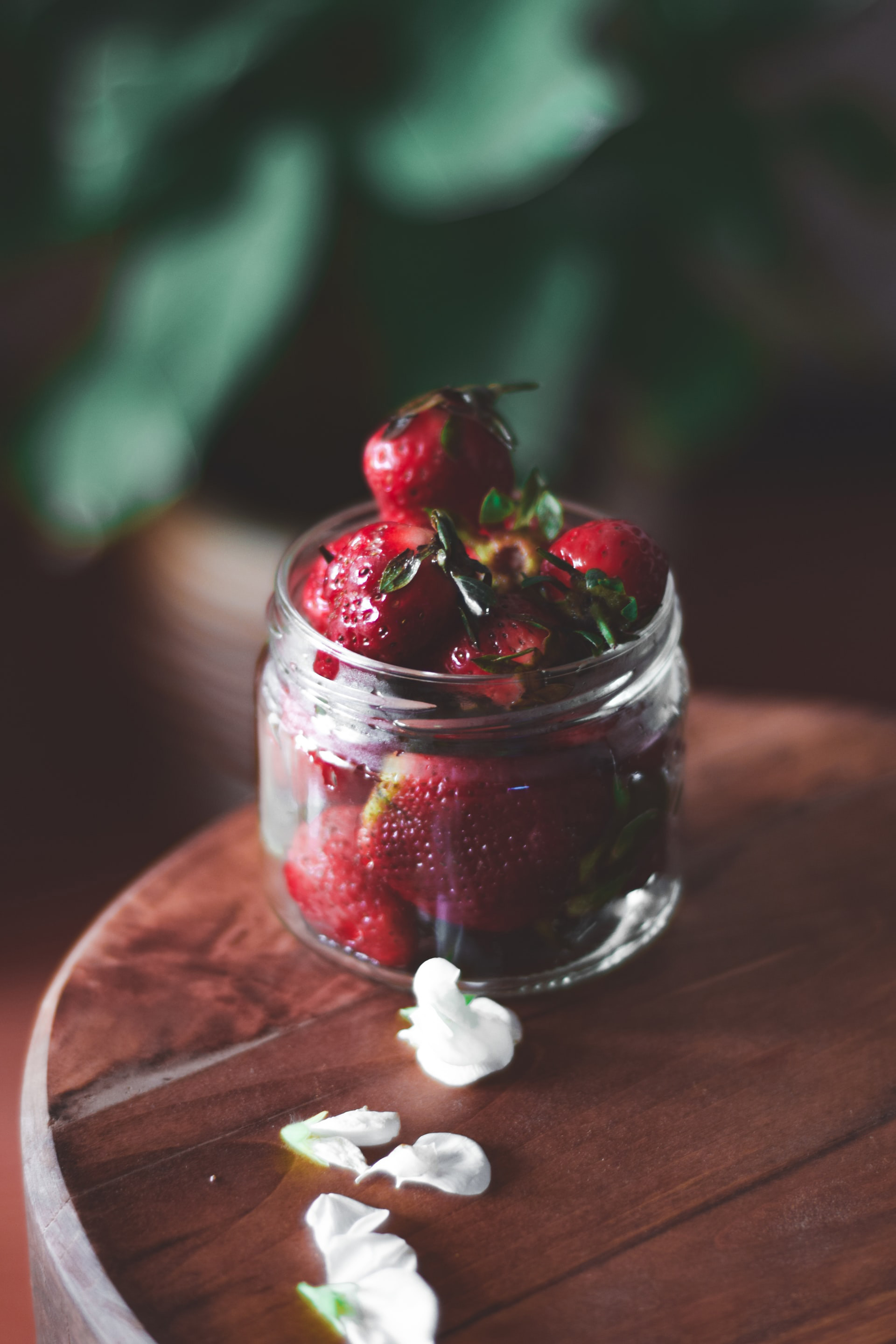 Strawberries in a small jar.