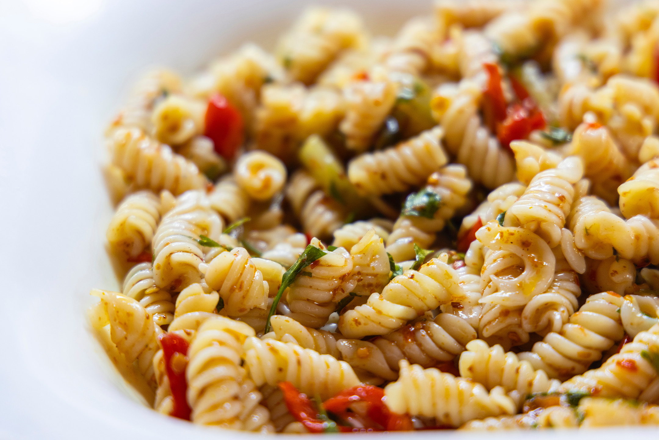 Photo of pasta salad in a bowl. 