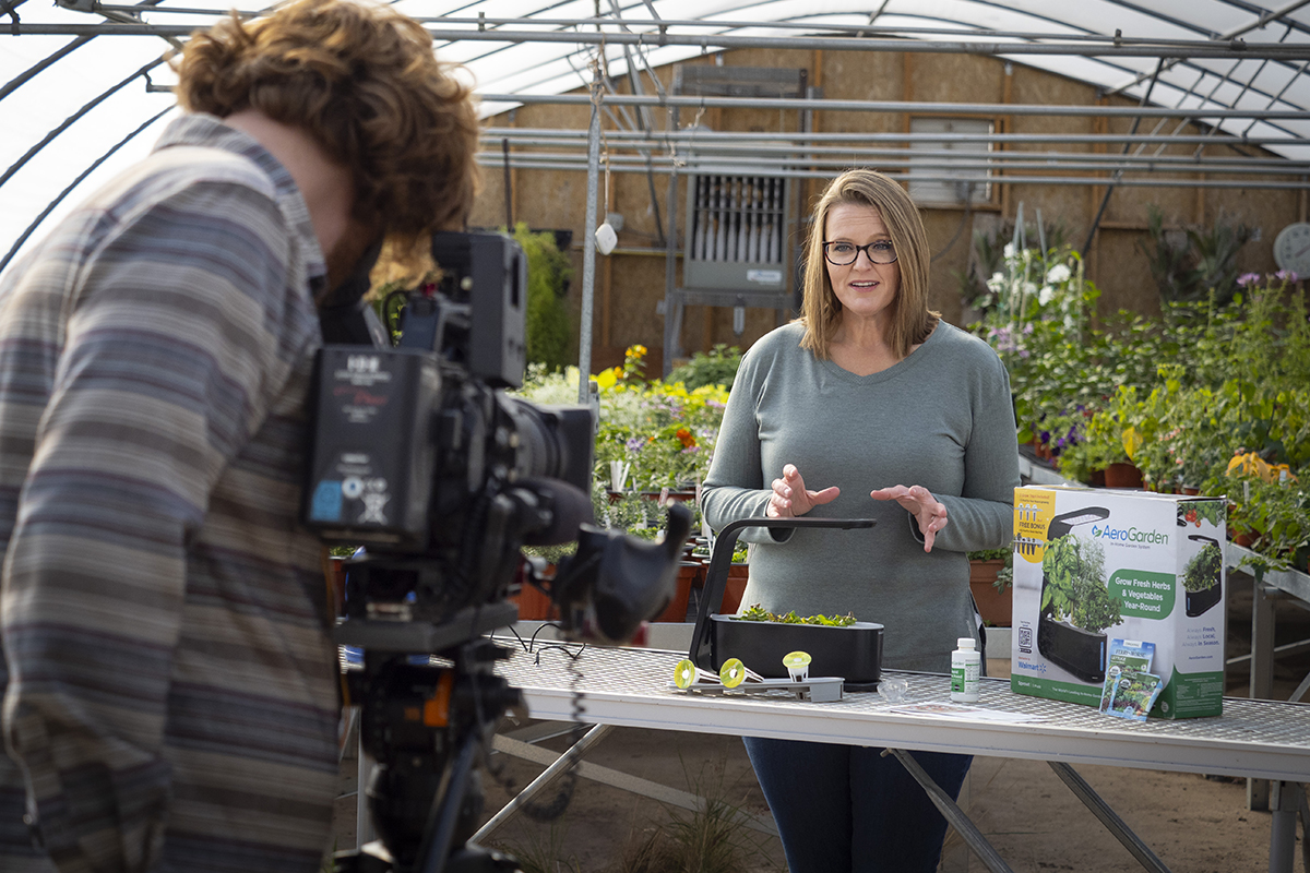 man and woman recording video segment of Oklahoma Gardening in greenhouse. man and woman recording video segment of Oklahoma Gardening in greenhouse.