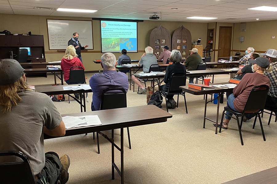 Students in a classroom and a instructor