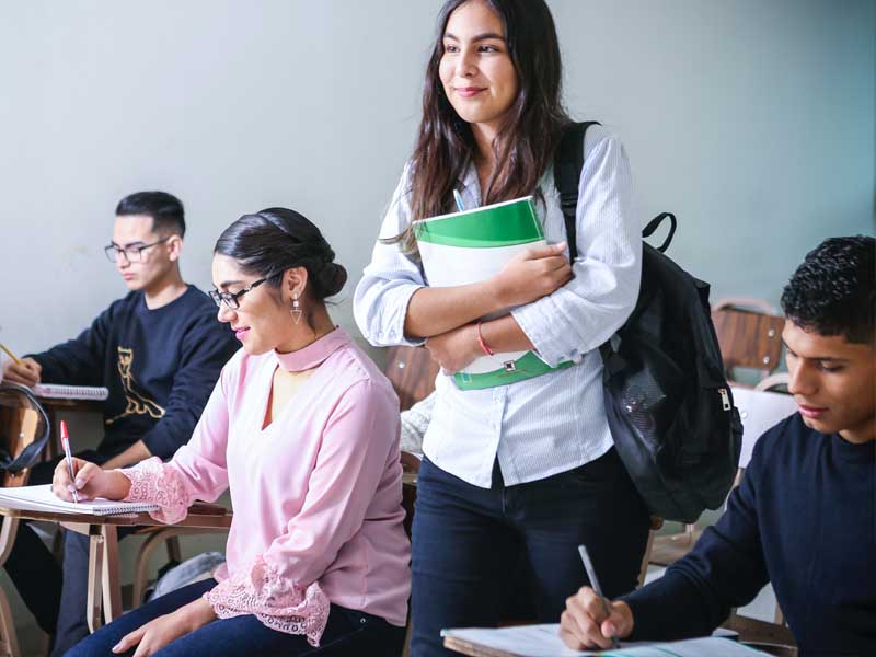 A group of students in a classroom.