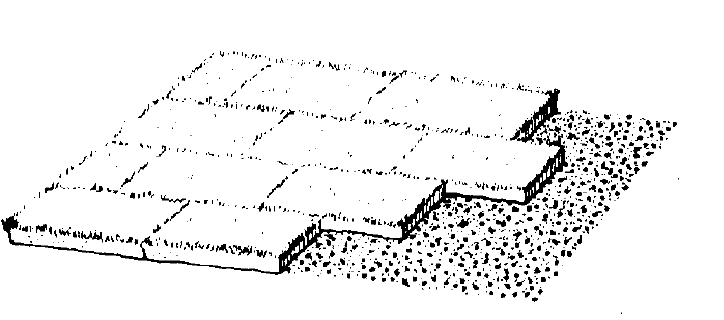 slabs or rolls of sod in a staggered, checker board pattern